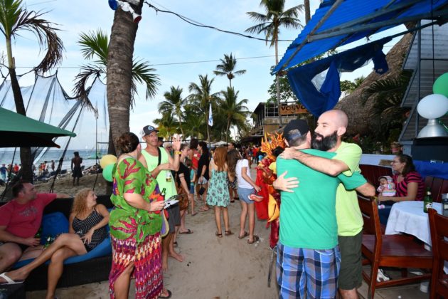 tourists in Cabarete beach on carnival day