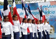 2019 DR Independence Parade in Sosua girls holding the DR flag