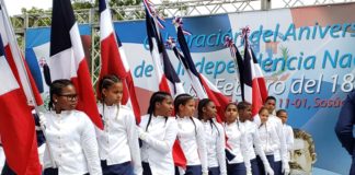 2019 DR Independence Parade in Sosua girls holding the DR flag