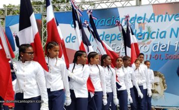 2019 DR Independence Parade in Sosua girls holding the DR flag