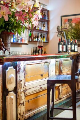 antique doors make up the bar design of La Casita Azul.