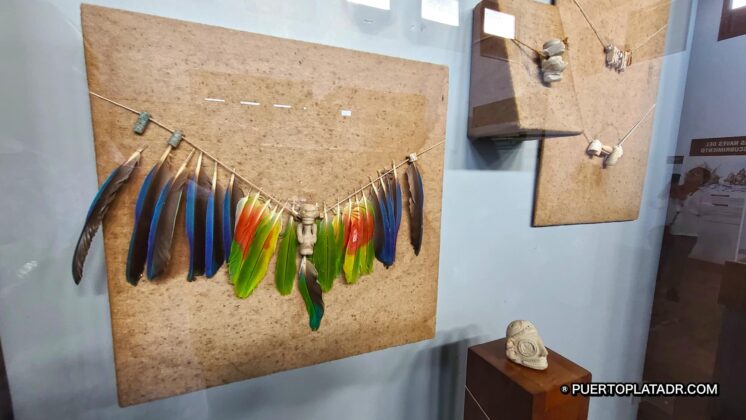 Feathers and amulets worn by Taino people.