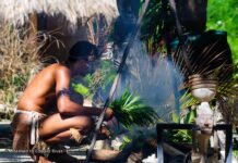 Taino Taino man cooking