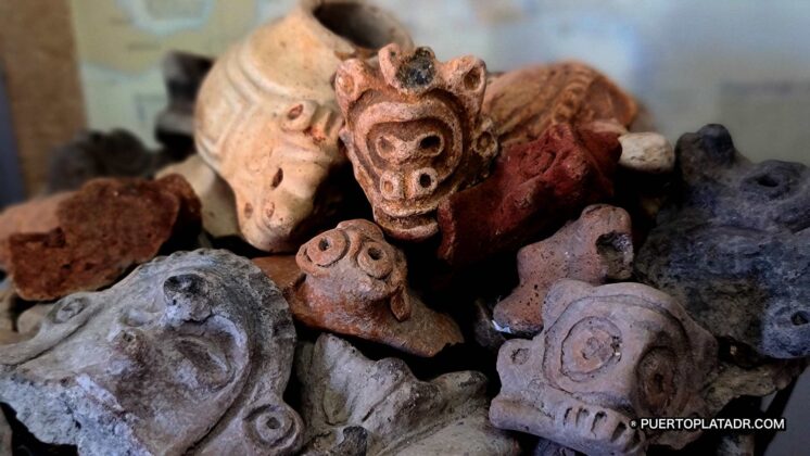 Various stone sculpted taino heads